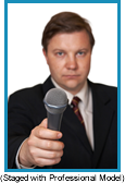 Man holding microphone in front of him as if asking for a answer. (Staged with profesisonal model).